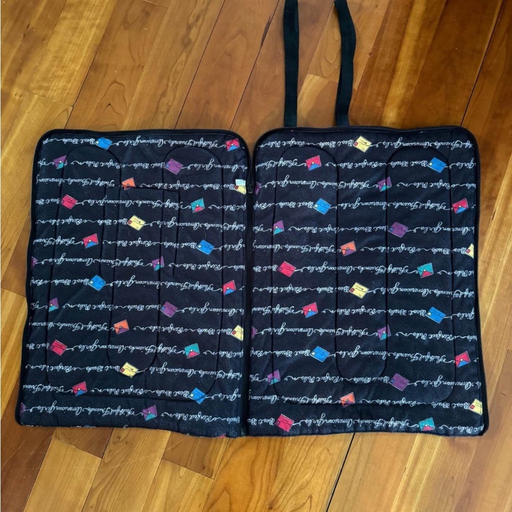 American Girl sleeping bag for doll and Coco the dog.